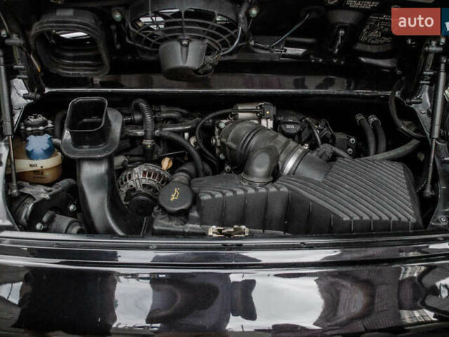 Черный Порше 911, объемом двигателя 3.6 л и пробегом 110 тыс. км за 41000 $, фото 56 на Automoto.ua