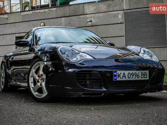 Черный Порше 911, объемом двигателя 3.6 л и пробегом 110 тыс. км за 41000 $, фото 28 на Automoto.ua