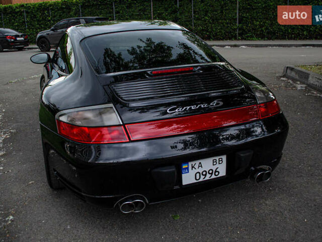 Черный Порше 911, объемом двигателя 3.6 л и пробегом 110 тыс. км за 41000 $, фото 13 на Automoto.ua