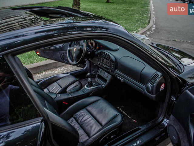 Черный Порше 911, объемом двигателя 3.6 л и пробегом 110 тыс. км за 41000 $, фото 35 на Automoto.ua