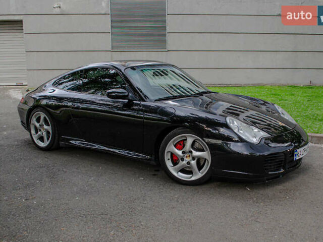 Черный Порше 911, объемом двигателя 3.6 л и пробегом 110 тыс. км за 41000 $, фото 5 на Automoto.ua