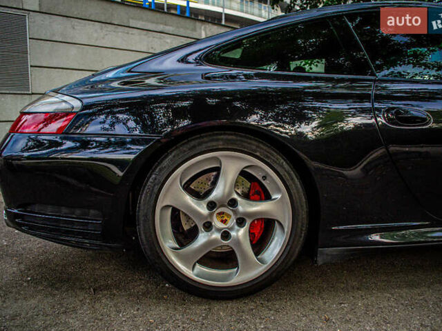 Черный Порше 911, объемом двигателя 3.6 л и пробегом 110 тыс. км за 41000 $, фото 31 на Automoto.ua