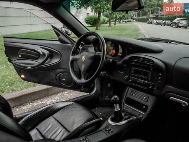 Черный Порше 911, объемом двигателя 3.6 л и пробегом 110 тыс. км за 41000 $, фото 51 на Automoto.ua