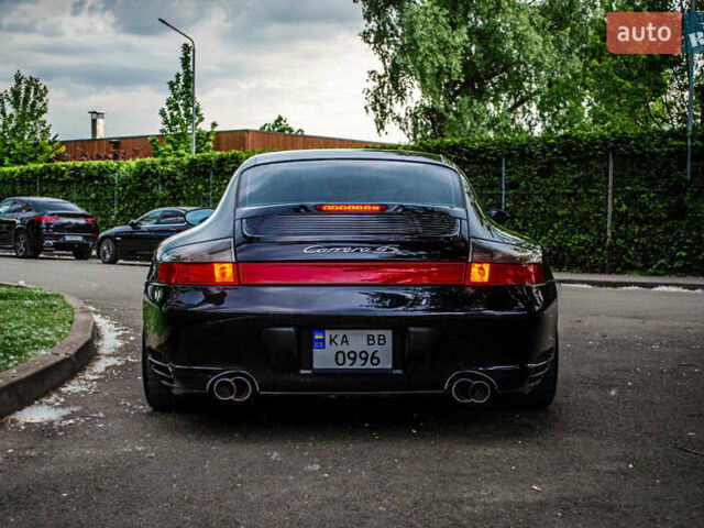 Черный Порше 911, объемом двигателя 3.6 л и пробегом 110 тыс. км за 41000 $, фото 32 на Automoto.ua