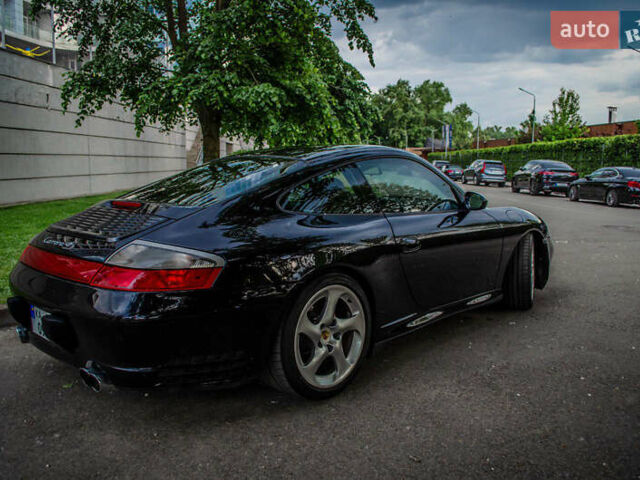 Черный Порше 911, объемом двигателя 3.6 л и пробегом 110 тыс. км за 41000 $, фото 18 на Automoto.ua