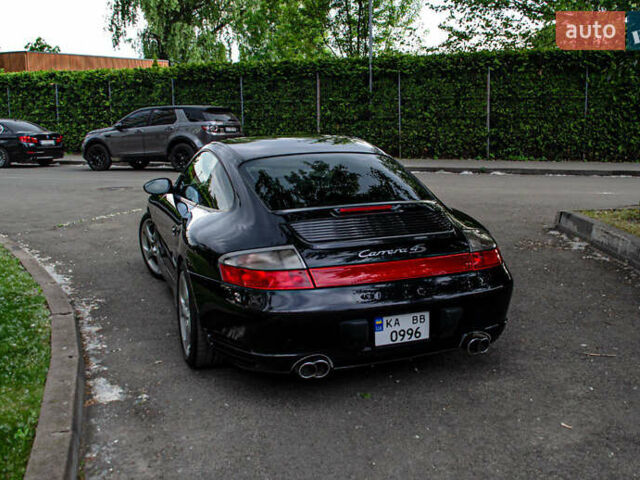 Черный Порше 911, объемом двигателя 3.6 л и пробегом 110 тыс. км за 41000 $, фото 12 на Automoto.ua