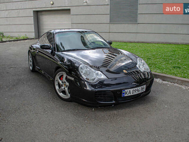 Черный Порше 911, объемом двигателя 3.6 л и пробегом 110 тыс. км за 41000 $, фото 6 на Automoto.ua