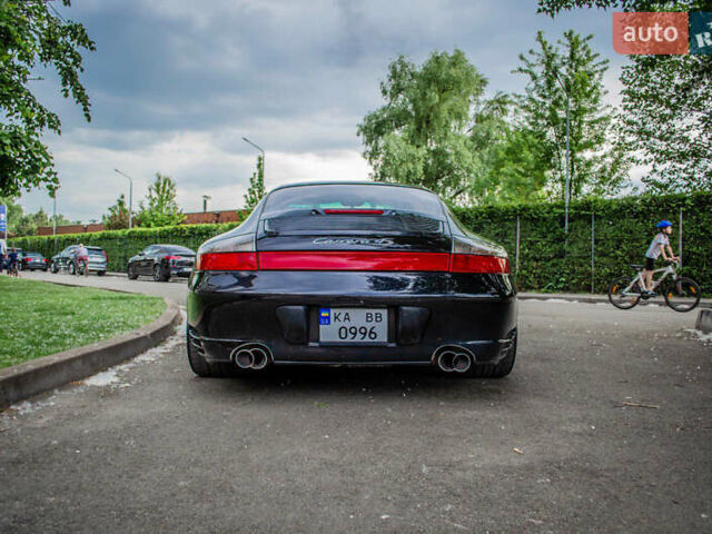 Черный Порше 911, объемом двигателя 3.6 л и пробегом 110 тыс. км за 41000 $, фото 1 на Automoto.ua