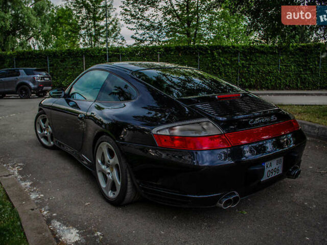 Черный Порше 911, объемом двигателя 3.6 л и пробегом 110 тыс. км за 41000 $, фото 3 на Automoto.ua