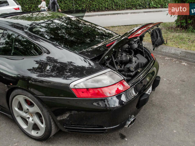 Черный Порше 911, объемом двигателя 3.6 л и пробегом 110 тыс. км за 41000 $, фото 60 на Automoto.ua