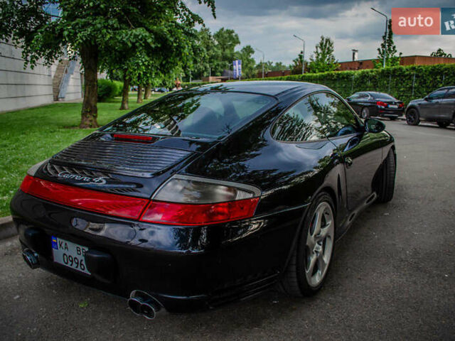 Черный Порше 911, объемом двигателя 3.6 л и пробегом 110 тыс. км за 41000 $, фото 2 на Automoto.ua