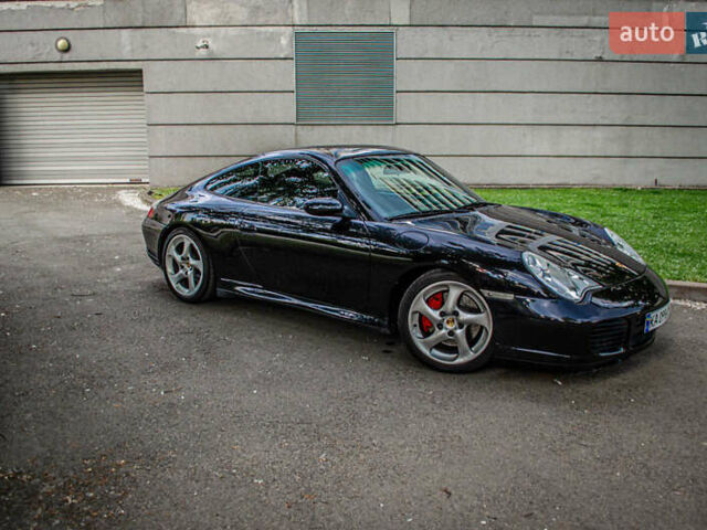 Черный Порше 911, объемом двигателя 3.6 л и пробегом 110 тыс. км за 41000 $, фото 4 на Automoto.ua