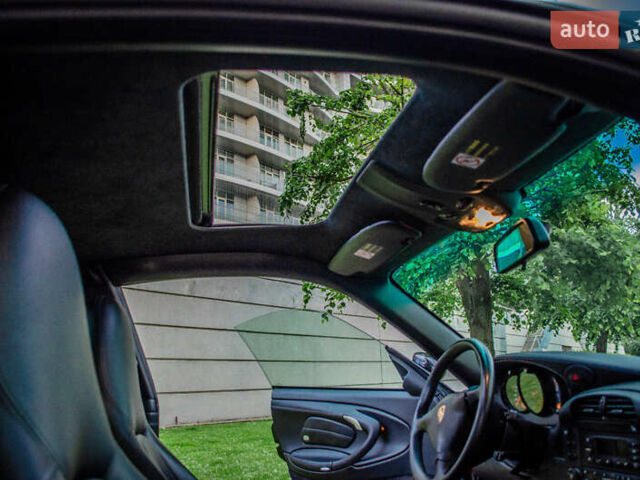 Черный Порше 911, объемом двигателя 3.6 л и пробегом 110 тыс. км за 41000 $, фото 34 на Automoto.ua