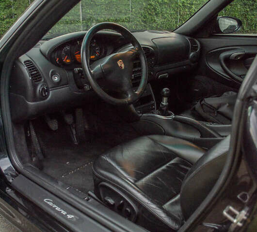 Черный Порше 911, объемом двигателя 3.6 л и пробегом 110 тыс. км за 41000 $, фото 40 на Automoto.ua