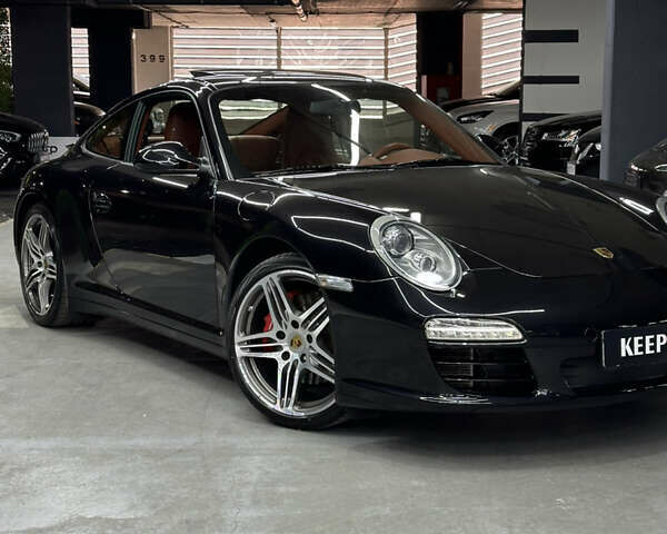 Чорний Порше 911, об'ємом двигуна 3.8 л та пробігом 49 тис. км за 75000 $, фото 1 на Automoto.ua