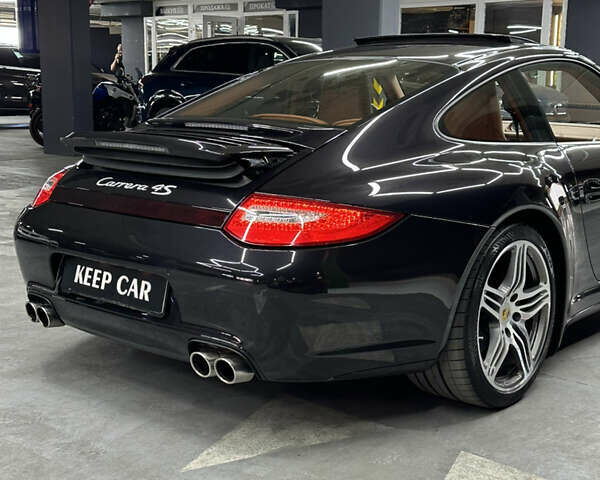 Черный Порше 911, объемом двигателя 3.8 л и пробегом 49 тыс. км за 75000 $, фото 21 на Automoto.ua