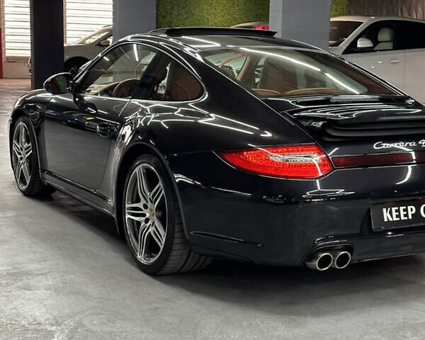 Черный Порше 911, объемом двигателя 3.8 л и пробегом 49 тыс. км за 75000 $, фото 18 на Automoto.ua
