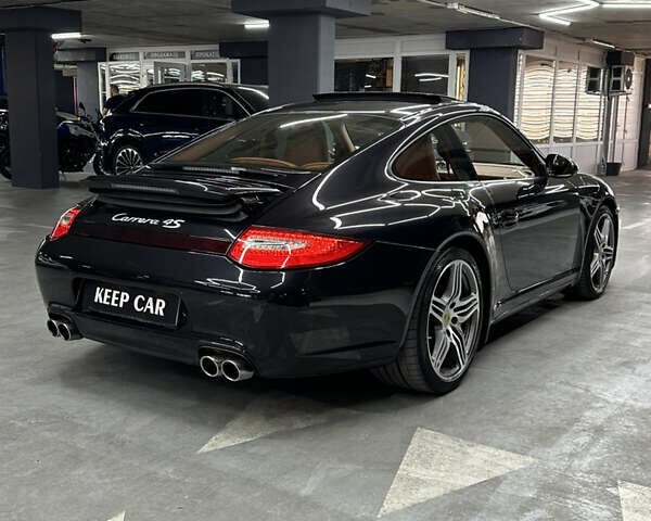 Черный Порше 911, объемом двигателя 3.8 л и пробегом 49 тыс. км за 75000 $, фото 19 на Automoto.ua
