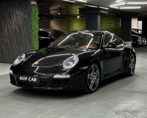 Черный Порше 911, объемом двигателя 3.8 л и пробегом 49 тыс. км за 75000 $, фото 8 на Automoto.ua