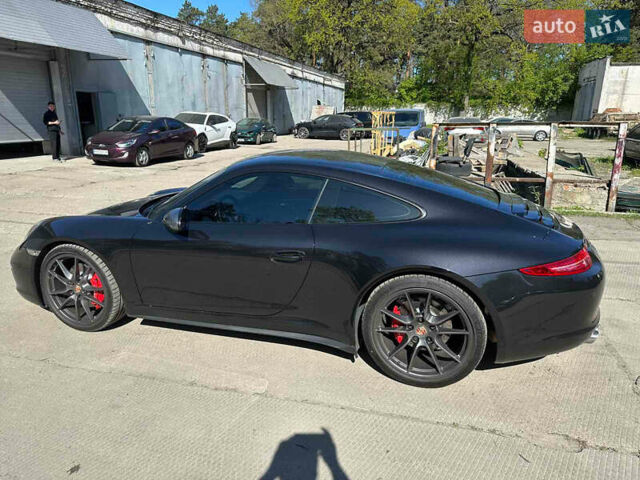 Черный Порше 911, объемом двигателя 3.8 л и пробегом 53 тыс. км за 82000 $, фото 19 на Automoto.ua