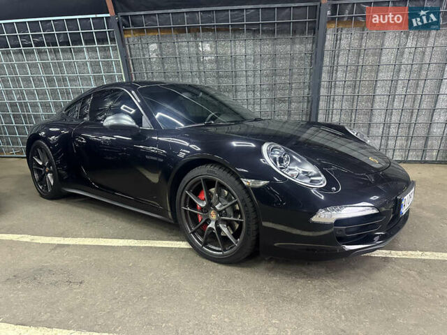 Черный Порше 911, объемом двигателя 3.8 л и пробегом 53 тыс. км за 82000 $, фото 3 на Automoto.ua