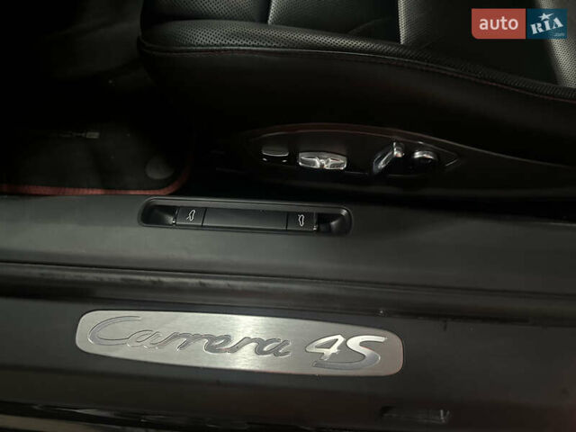 Черный Порше 911, объемом двигателя 3.8 л и пробегом 53 тыс. км за 82000 $, фото 16 на Automoto.ua