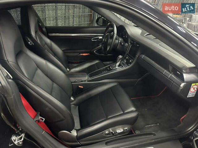 Черный Порше 911, объемом двигателя 3.8 л и пробегом 53 тыс. км за 82000 $, фото 6 на Automoto.ua