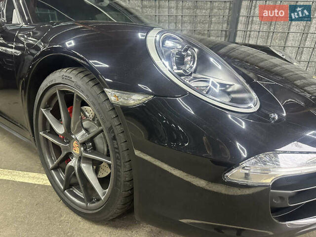 Черный Порше 911, объемом двигателя 3.8 л и пробегом 53 тыс. км за 82000 $, фото 9 на Automoto.ua