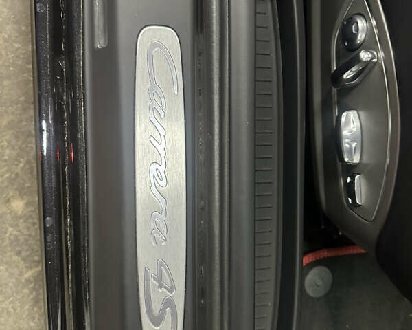 Черный Порше 911, объемом двигателя 3.8 л и пробегом 53 тыс. км за 82000 $, фото 8 на Automoto.ua