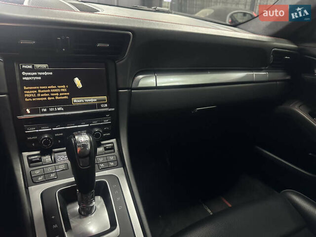 Черный Порше 911, объемом двигателя 3.8 л и пробегом 53 тыс. км за 82000 $, фото 12 на Automoto.ua