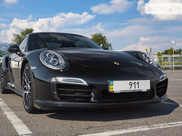 Черный Порше 911, объемом двигателя 3.8 л и пробегом 57 тыс. км за 139000 $, фото 5 на Automoto.ua