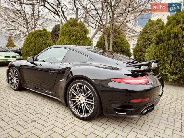 Черный Порше 911, объемом двигателя 3.8 л и пробегом 53 тыс. км за 125000 $, фото 3 на Automoto.ua
