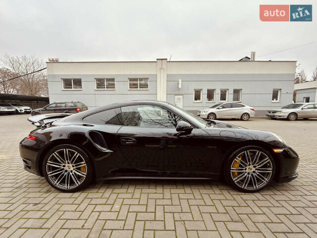 Черный Порше 911, объемом двигателя 3.8 л и пробегом 53 тыс. км за 125000 $, фото 6 на Automoto.ua