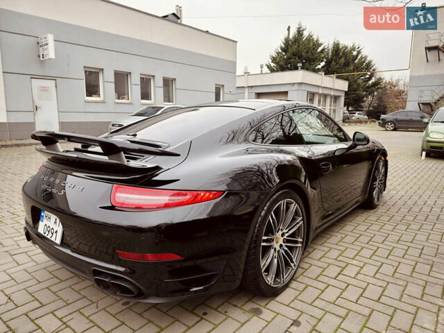 Черный Порше 911, объемом двигателя 3.8 л и пробегом 53 тыс. км за 125000 $, фото 5 на Automoto.ua