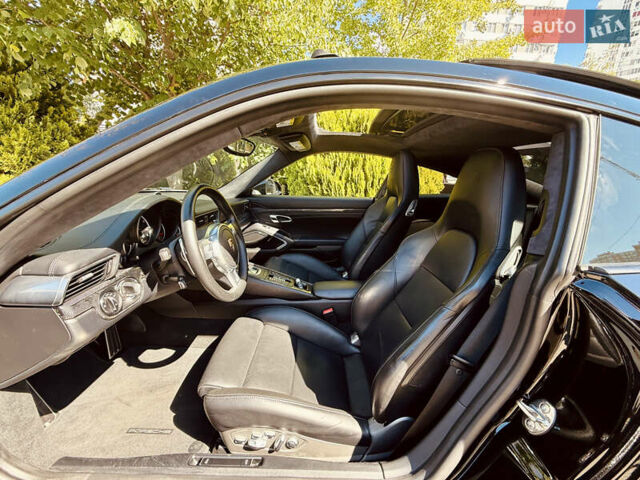 Черный Порше 911, объемом двигателя 3.8 л и пробегом 53 тыс. км за 123000 $, фото 13 на Automoto.ua