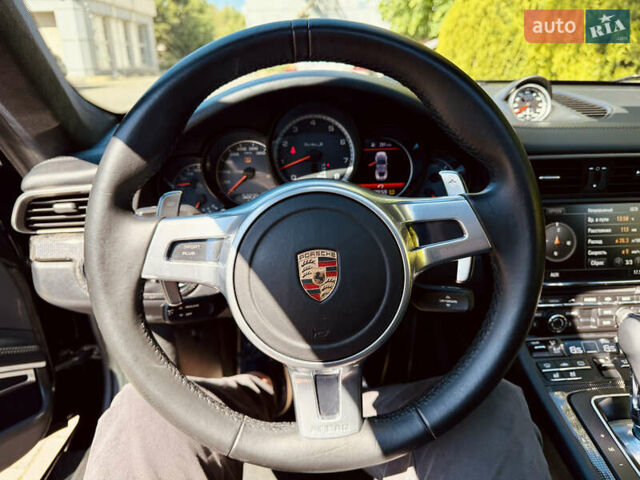 Черный Порше 911, объемом двигателя 3.8 л и пробегом 53 тыс. км за 123000 $, фото 15 на Automoto.ua