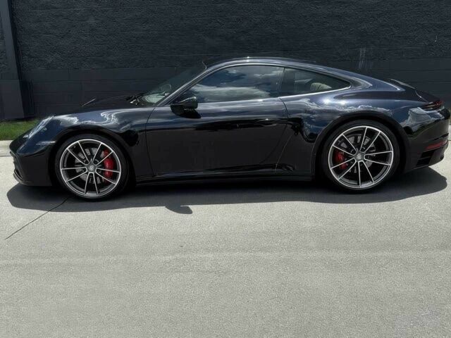 Черный Порше 911, объемом двигателя 3 л и пробегом 51 тыс. км за 49000 $, фото 3 на Automoto.ua
