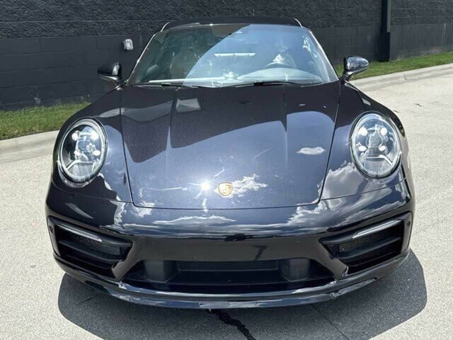 Черный Порше 911, объемом двигателя 3 л и пробегом 48 тыс. км за 28000 $, фото 1 на Automoto.ua