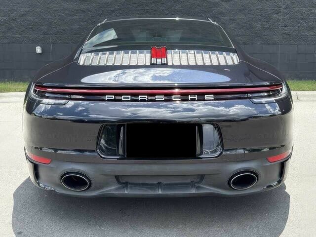 Черный Порше 911, объемом двигателя 3 л и пробегом 51 тыс. км за 49000 $, фото 4 на Automoto.ua