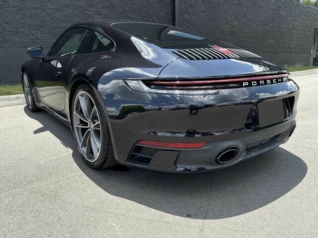 Черный Порше 911, объемом двигателя 3 л и пробегом 44 тыс. км за 85000 $, фото 7 на Automoto.ua