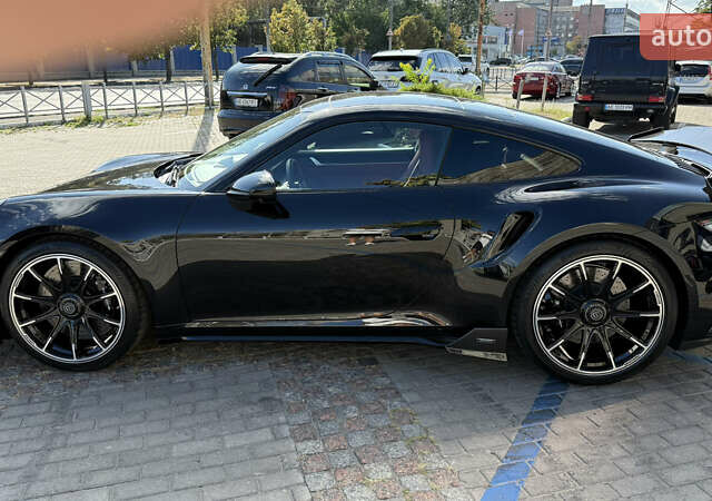 Черный Порше 911, объемом двигателя 3.75 л и пробегом 6 тыс. км за 390000 $, фото 6 на Automoto.ua