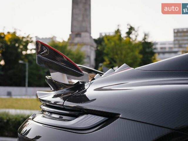 Черный Порше 911, объемом двигателя 3.75 л и пробегом 7 тыс. км за 410000 $, фото 2 на Automoto.ua