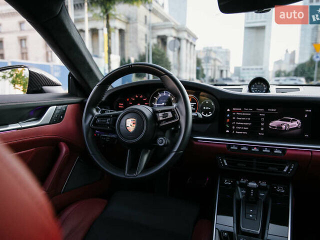Черный Порше 911, объемом двигателя 3.75 л и пробегом 7 тыс. км за 410000 $, фото 23 на Automoto.ua