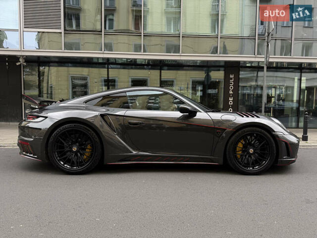 Черный Порше 911, объемом двигателя 3.75 л и пробегом 7 тыс. км за 410000 $, фото 34 на Automoto.ua
