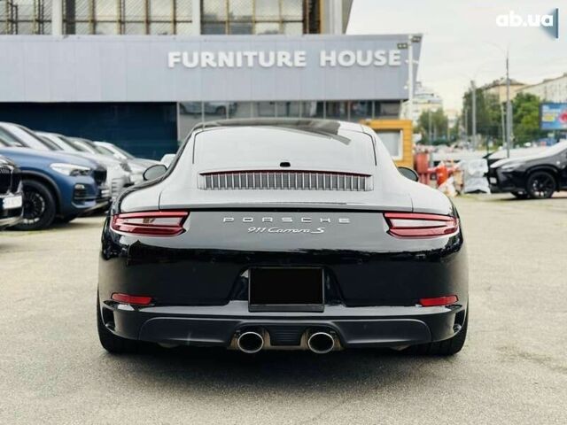 Порше 911, объемом двигателя 3 л и пробегом 34 тыс. км за 86500 $, фото 4 на Automoto.ua