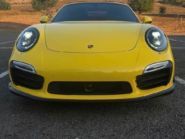 Желтый Порше 911, объемом двигателя 3.8 л и пробегом 74 тыс. км за 78000 $, фото 1 на Automoto.ua