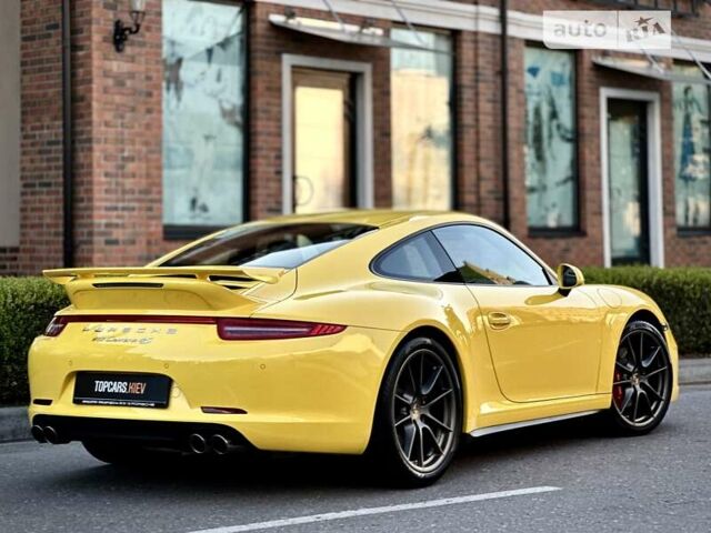 Желтый Порше 911, объемом двигателя 3.8 л и пробегом 3 тыс. км за 111000 $, фото 45 на Automoto.ua