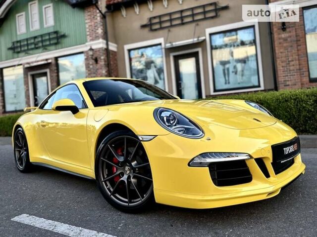 Желтый Порше 911, объемом двигателя 3.8 л и пробегом 3 тыс. км за 111000 $, фото 52 на Automoto.ua