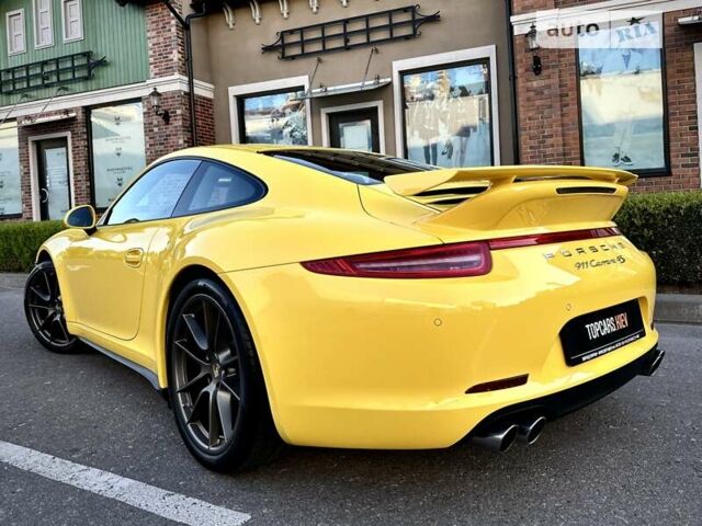 Желтый Порше 911, объемом двигателя 3.8 л и пробегом 3 тыс. км за 111000 $, фото 40 на Automoto.ua