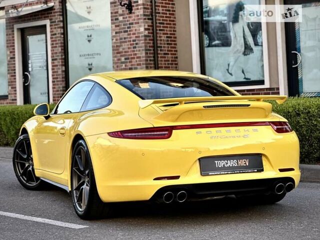 Желтый Порше 911, объемом двигателя 3.8 л и пробегом 3 тыс. км за 111000 $, фото 38 на Automoto.ua